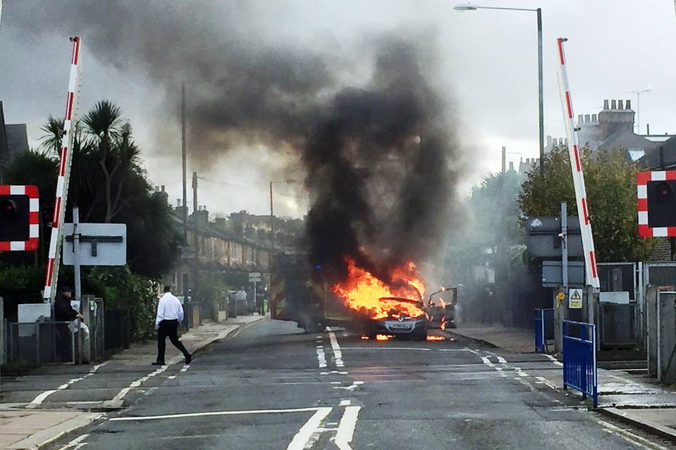 File photo from November 2015 of a Vauxhall Zafira that caught light on Manor Road in southwest London.... File photo from November 2015 of a Vauxhall Zafira that caught light on Manor Road in southwest London.